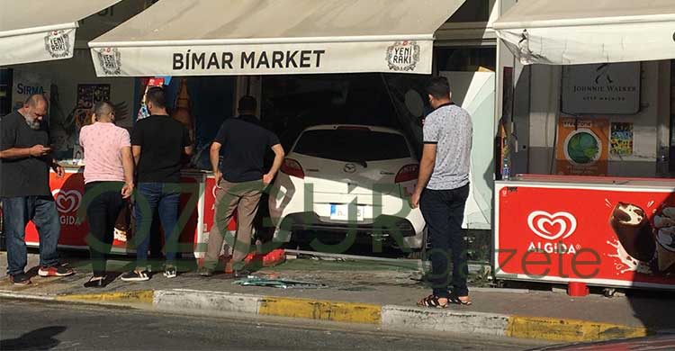 ozgur_gazete_kibris_Arac_markete_girdi_surucusu_kacti1